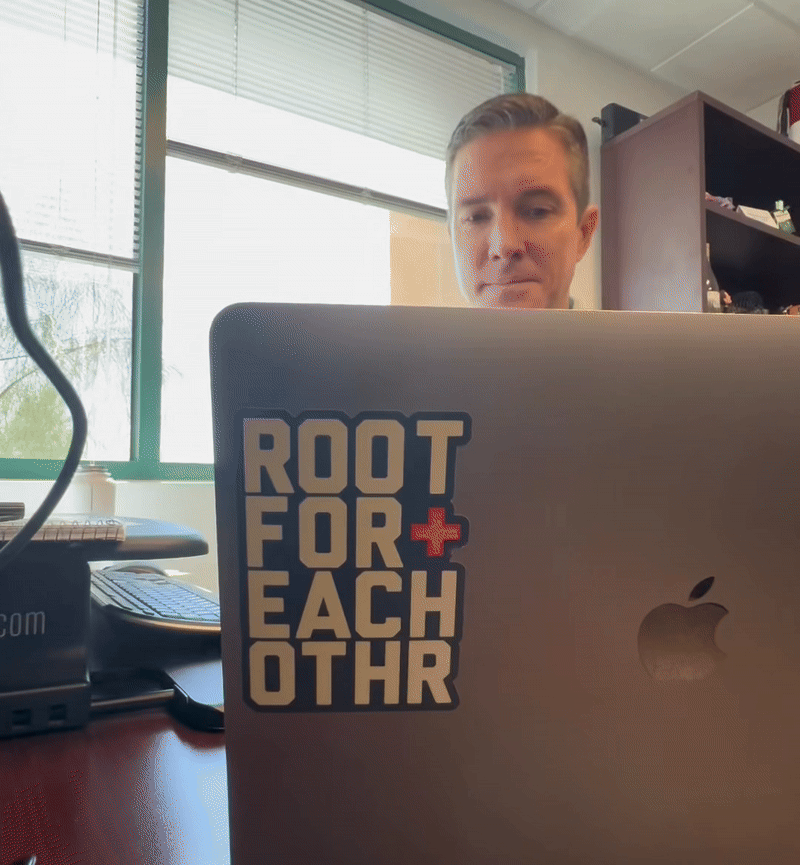 Phil pointing to Root for each other sticker